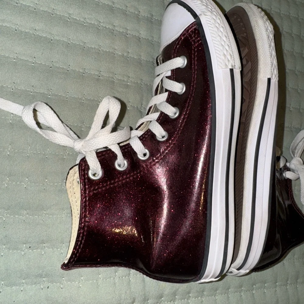 Shimmer black cherry high top Chuck Taylor converse big kids size 3. GUC